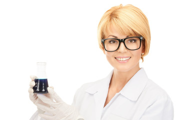 lab worker holding up test tube