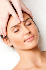 Fototapeta na wymiar woman receiving face massage
