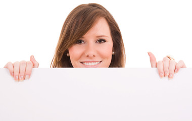 Beautiful woman holding empty white board