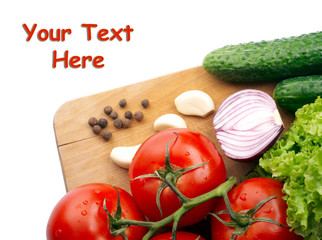Fresh vegetables on wooden hardboard
