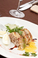 meat pie with egg and sauce