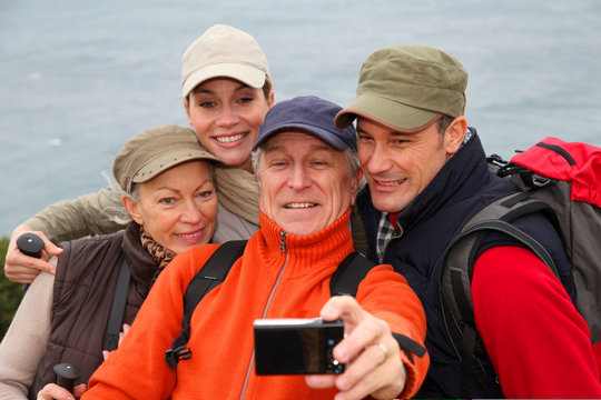 Group of hikers taking picture of themselves