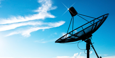 satellite dish antennas under sky