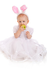 Obraz na płótnie Canvas Baby eats an apple