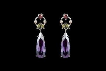 colored earrings on black