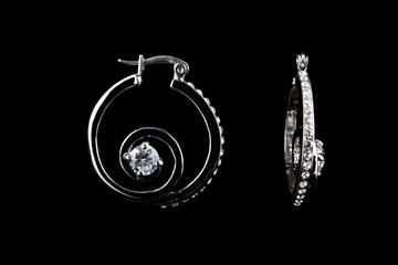 colored earrings on black