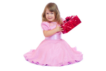 Little smiling girl with gift box