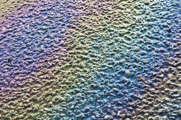 Benzinlache auf dem Asphalt