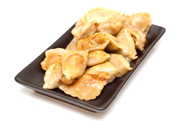 Chinese pork dumplings on white background.