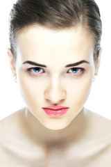 Fototapeta premium Portrait of the beautiful girl in light tones