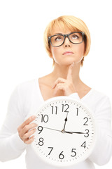 woman holding big clock