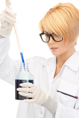 lab worker holding up test tube