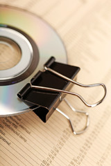 Close photo of paperclip attached to disk.