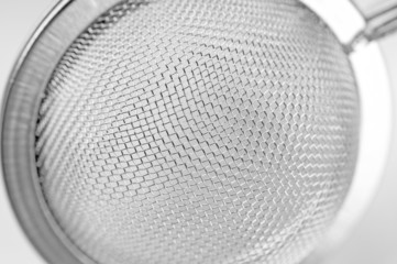 metallic mesh of tea strainer macro