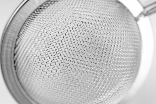 metallic mesh of tea strainer macro