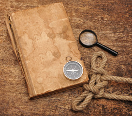 old book and compass