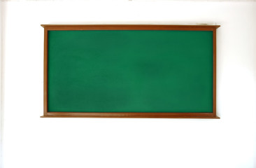 green board on white wall