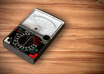 volt meter on wooden table
