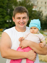 Happy father with her baby