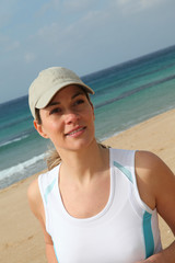 Closeup of woman running on the beach