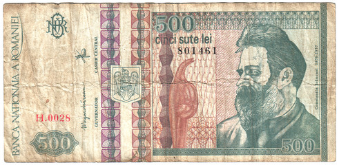 Old paper money of the Romania, on white background.