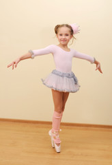 Little girl at the ballet class