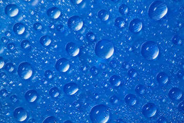 drops of water on blue background
