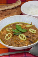 Chicken and sweet potato curry with rice and naan bread