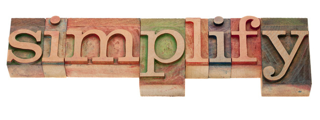 simplify - word in letterpress type