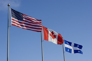 US Canadian and Quebec Flags