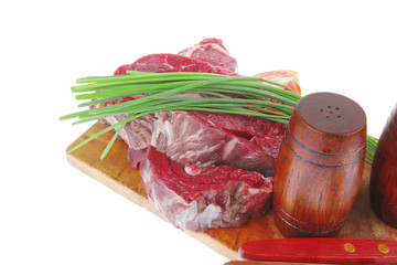 meat portion: bloody beef fillet on plate