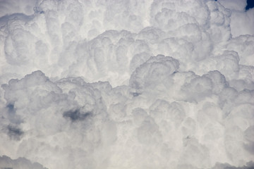 Fototapeta premium Puffy clouds grey and white