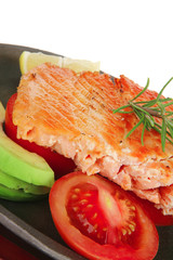 roast salmon piece with tomatoes