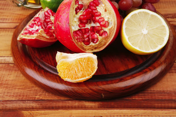fruits on wooden plate