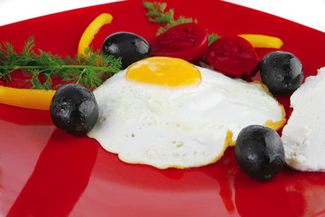 egg served on red dish