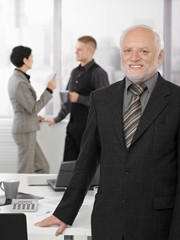 Fototapeta premium Portrait of proud senior executive in office