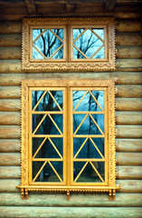 wooden window on the log wall