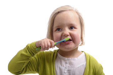little girl washing her teeth