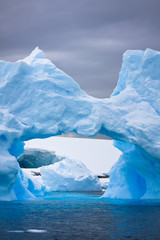 Large Arctic iceberg with a cavity inside