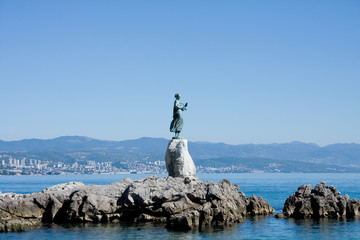 Naklejka premium Bronze sculpture of Maiden with Seagull, Opatija, Croatia