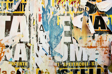 Torn advertisement posters