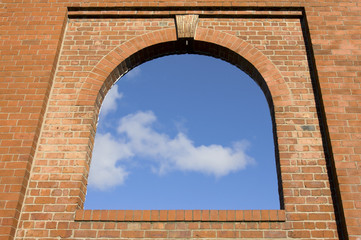 Arch window in the brick wall