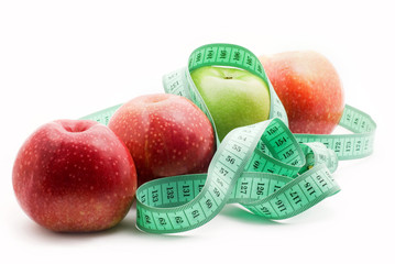 measuring tape and apple