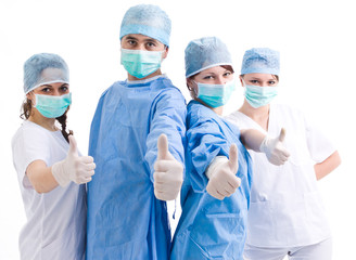 medical team showing thumbs up