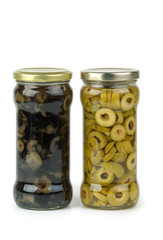 Glass jar with sliced green and black olives
