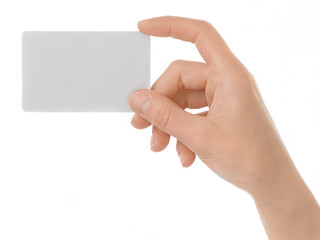 Obraz premium Female hand holding a blank paper