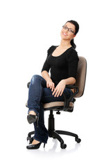 Fototapeta premium Young happy woman sitting on a wheel chair