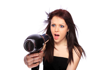 Obraz premium woman with fashion hairstyle holding hairdryer