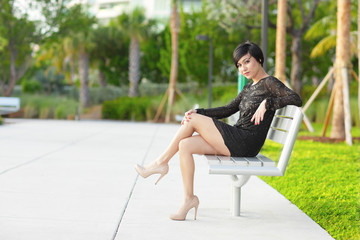 Woman sitting on a park bench