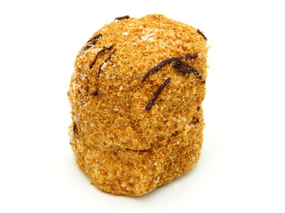 Honey cake with chocolate on a white background